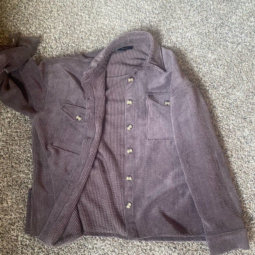 Super cute button up- easy to layer and can easily be dressed up or down!